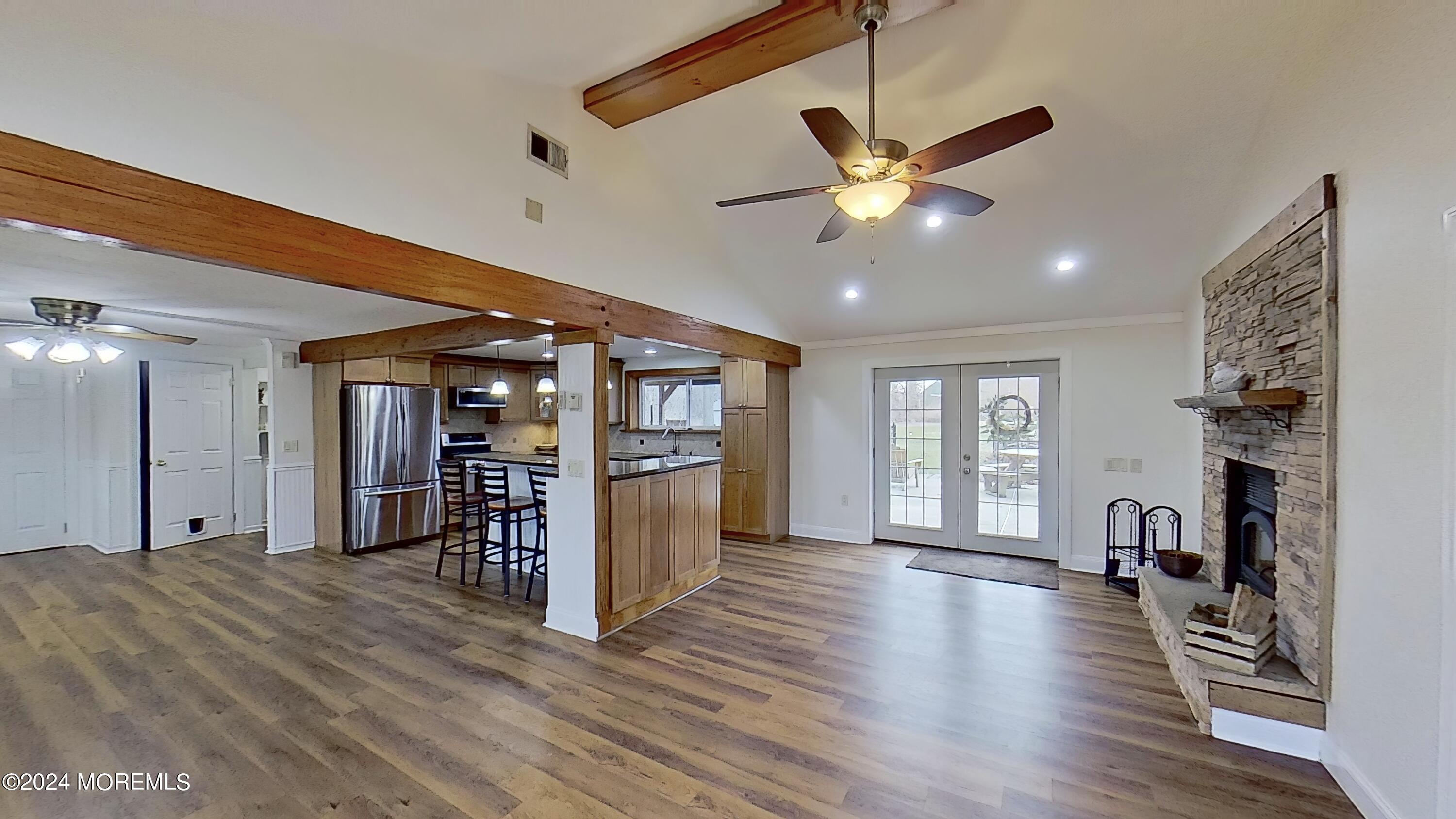 144 Windeler Road Howell, NJ 07731 - Photo 8 of 59 a view of a livingroom with furniture ceiling fan and window