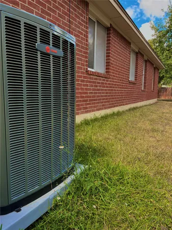 a view of backyard of a house