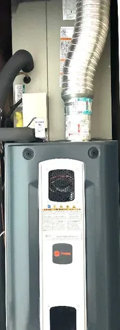 a utility room with washer and dryer