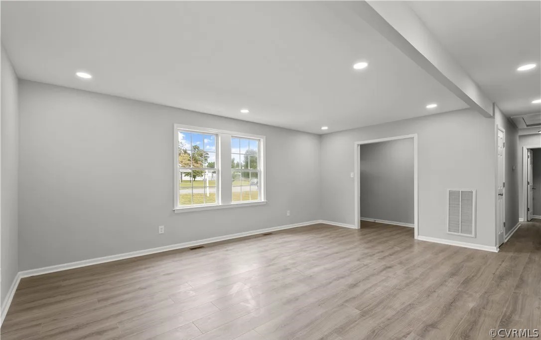 16216 Mistora Road Chester, VA 23831 - Photo 12 of 17 Unfurnished living room featuring wood-type floori