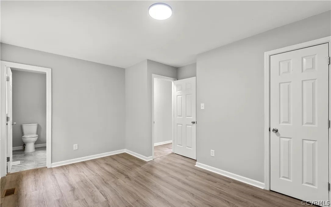 16216 Mistora Road Chester, VA 23831 - Photo 9 of 17 Unfurnished bedroom featuring ensuite bath and har