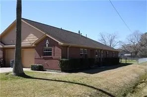 a front view of house with a yard