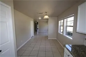 a view of livingroom with furniture and window