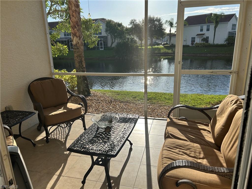 1390 Tiffany Lane, Unit 2302 Naples, FL 34105 - Photo 25 of 37 a view of a balcony with chairs