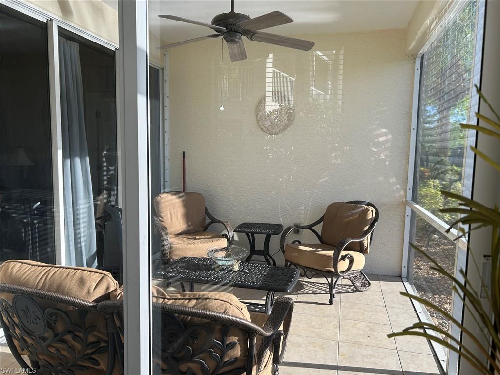 1390 Tiffany Lane, Unit 2302 Naples, FL 34105 - Photo 26 of 37 a living room with furniture