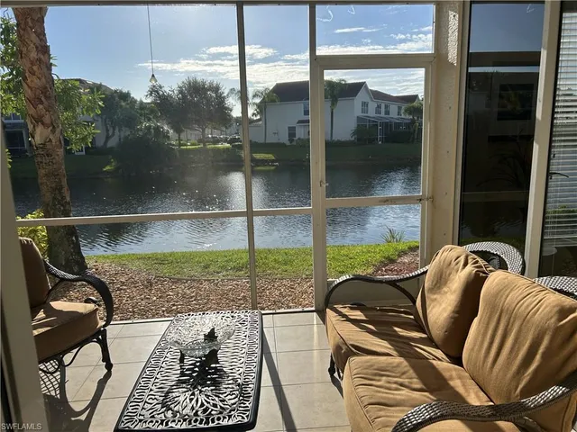 a living room with a couch and a table