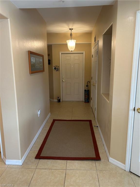 1390 Tiffany Lane, Unit 2302 Naples, FL 34105 - Photo 33 of 37 a view of a livingroom with a sink