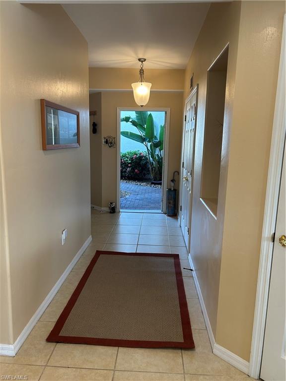 1390 Tiffany Lane, Unit 2302 Naples, FL 34105 - Photo 34 of 37 en view interior of the house and wooden floor