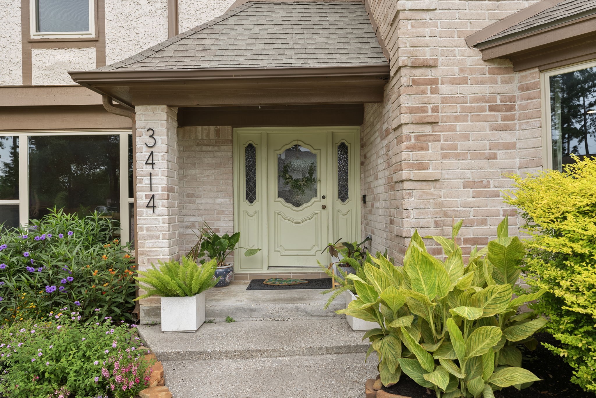 3414 Blue Candle Drive Spring, TX 77388 - Photo 2 of 29 Charming front entrance with a well manicured front yard and front porch.