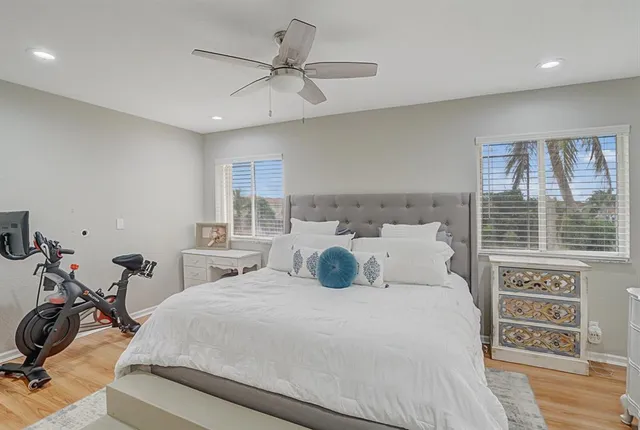 a bathroom with double sink and a mirror
