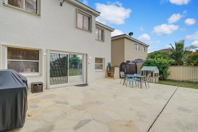 a view of a backyard with a small cabin