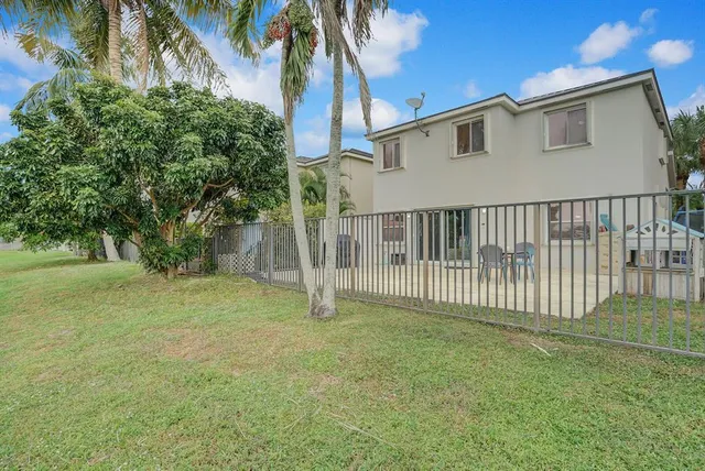 a view of outdoor space with swimming pool
