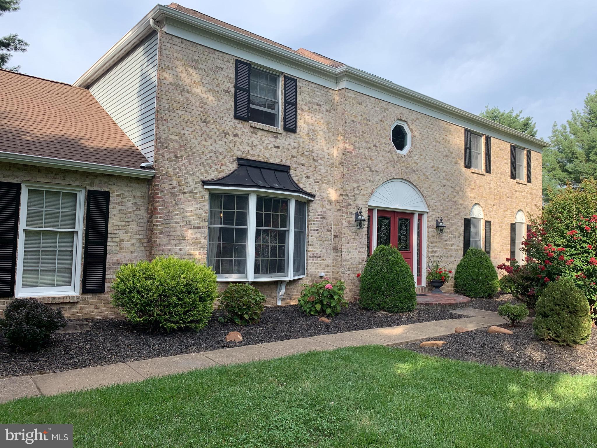 1292 Heller Drive Yardley, PA 19067 - Photo 3 of 36 a front view of a house with garden
