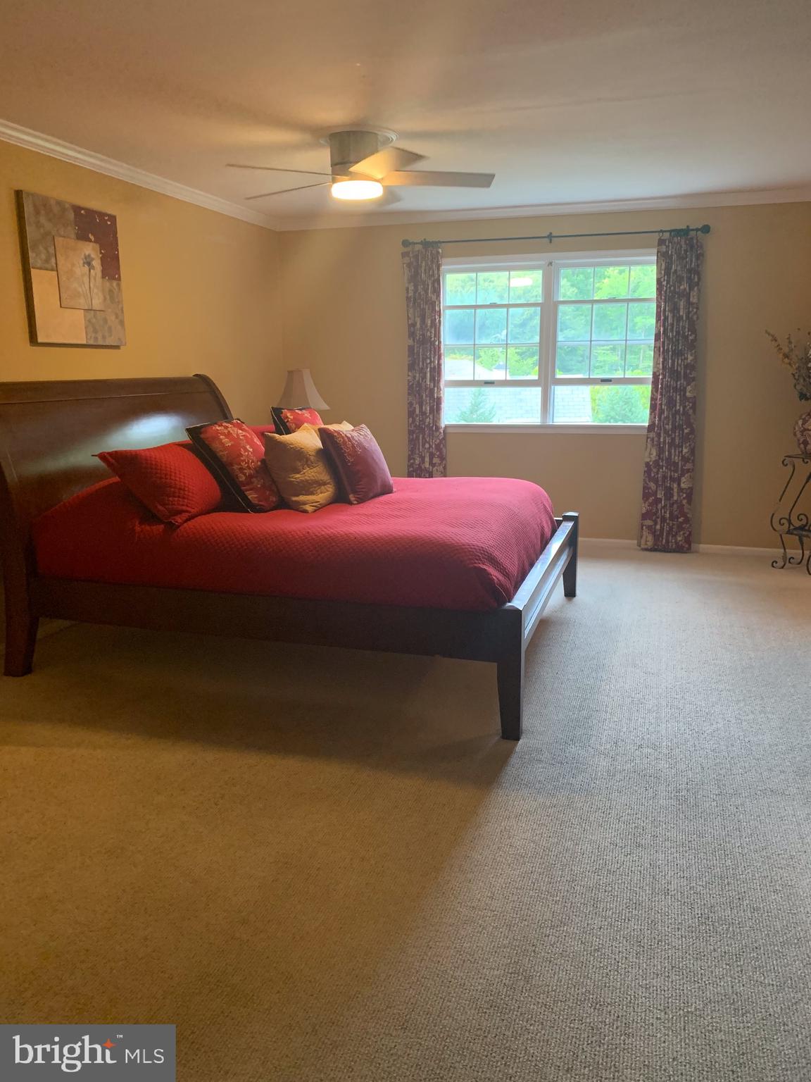 1292 Heller Drive Yardley, PA 19067 - Photo 21 of 36 a bedroom with a bed and window