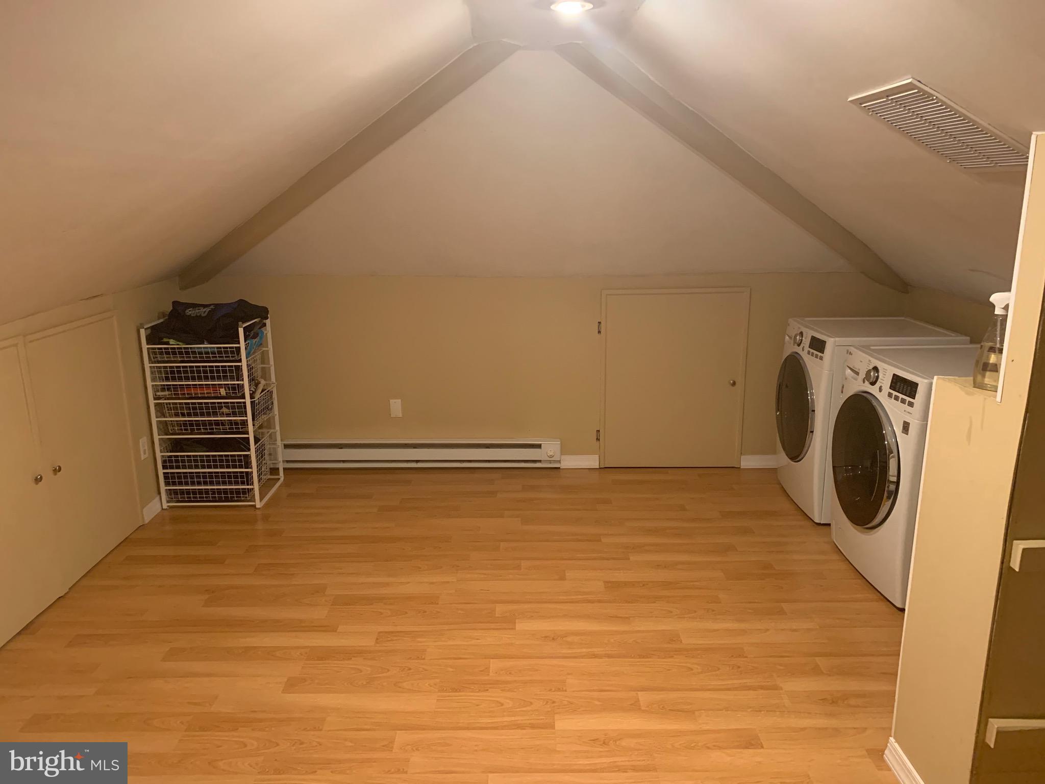 1292 Heller Drive Yardley, PA 19067 - Photo 23 of 36 a view of empty room with wooden floor