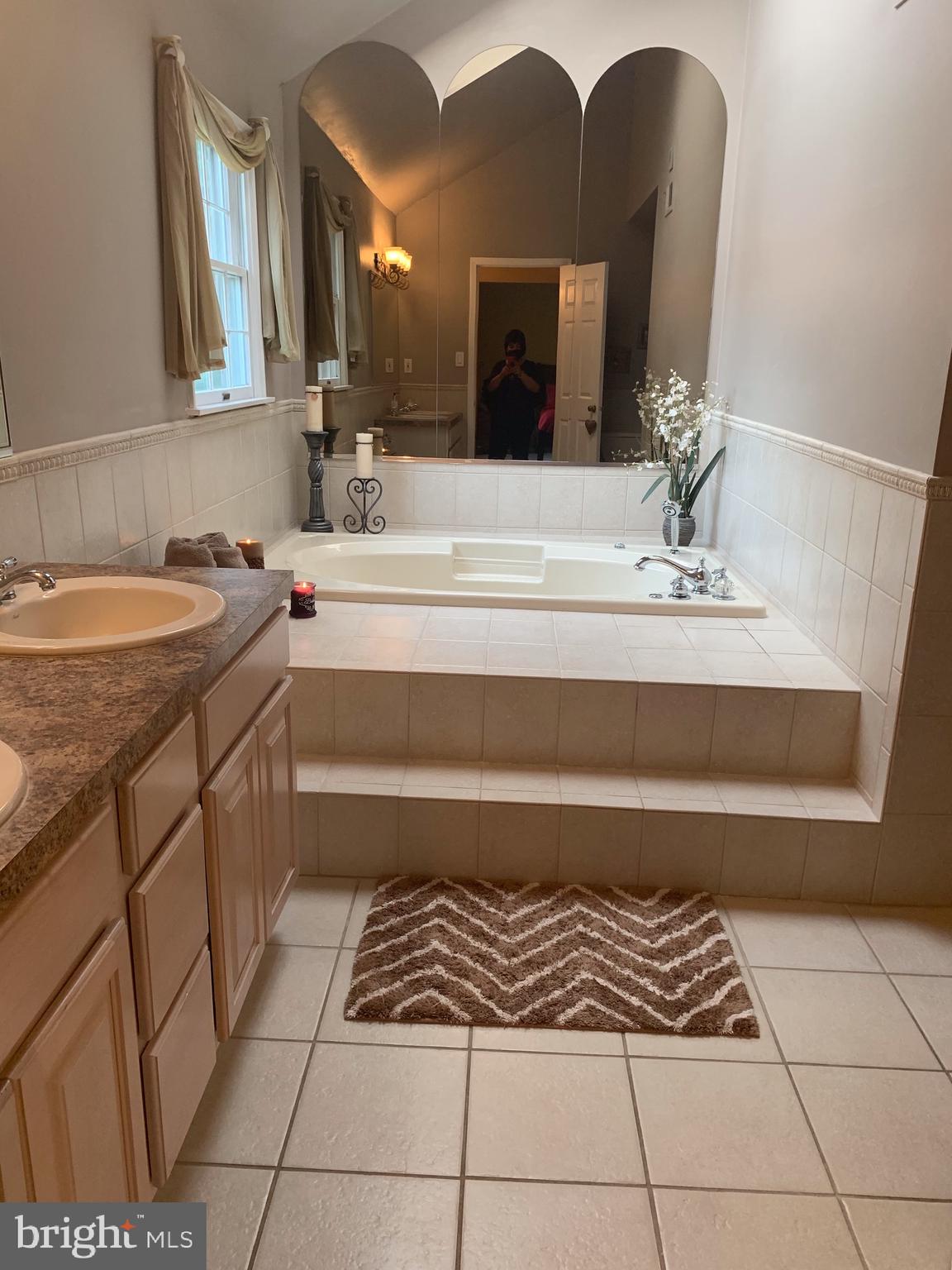 1292 Heller Drive Yardley, PA 19067 - Photo 25 of 36 a bathroom with a sink and a mirror