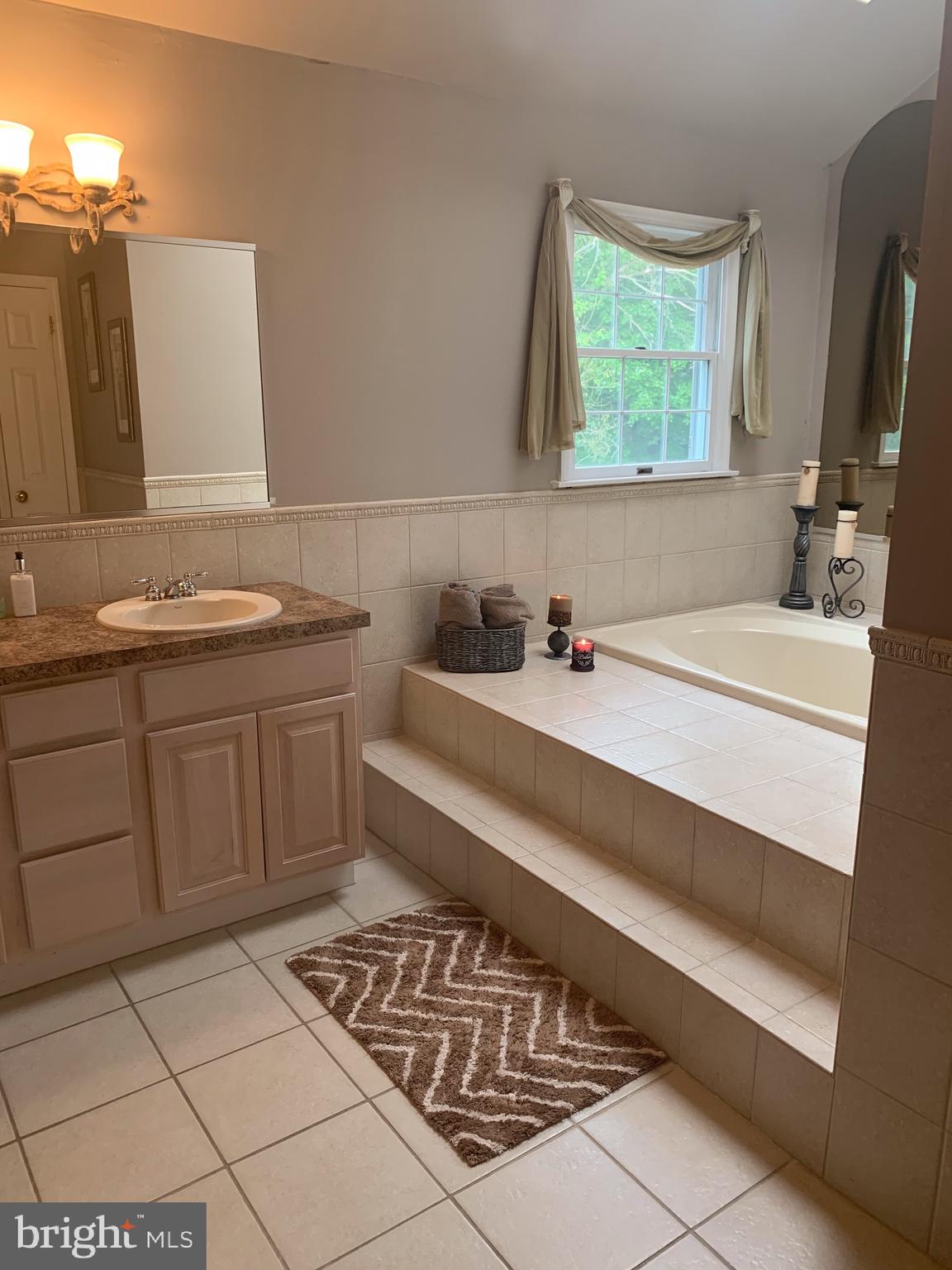 1292 Heller Drive Yardley, PA 19067 - Photo 26 of 36 a bathroom with a sink and a mirror
