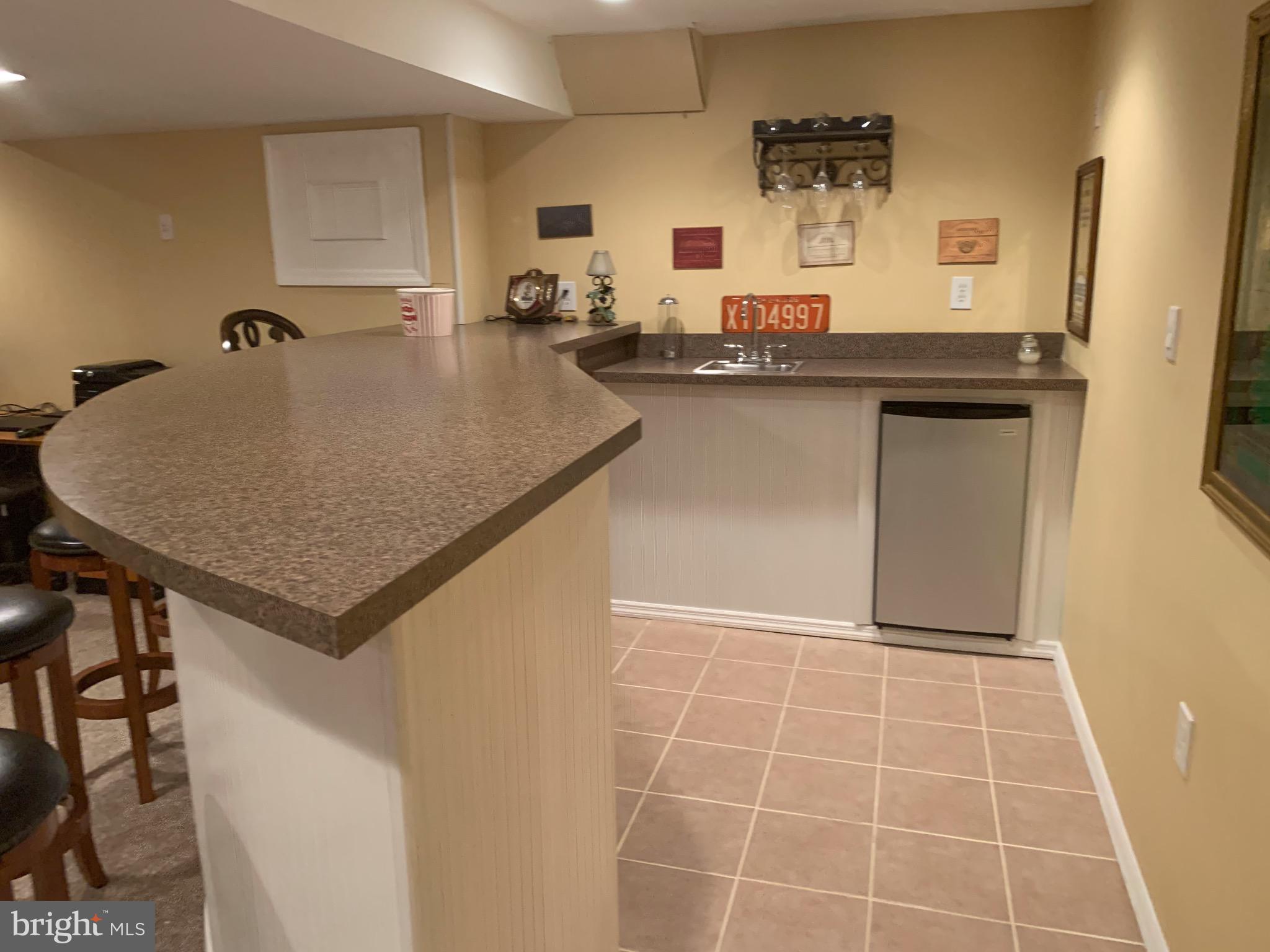 1292 Heller Drive Yardley, PA 19067 - Photo 34 of 36 a kitchen with a sink a counter space and cabinets