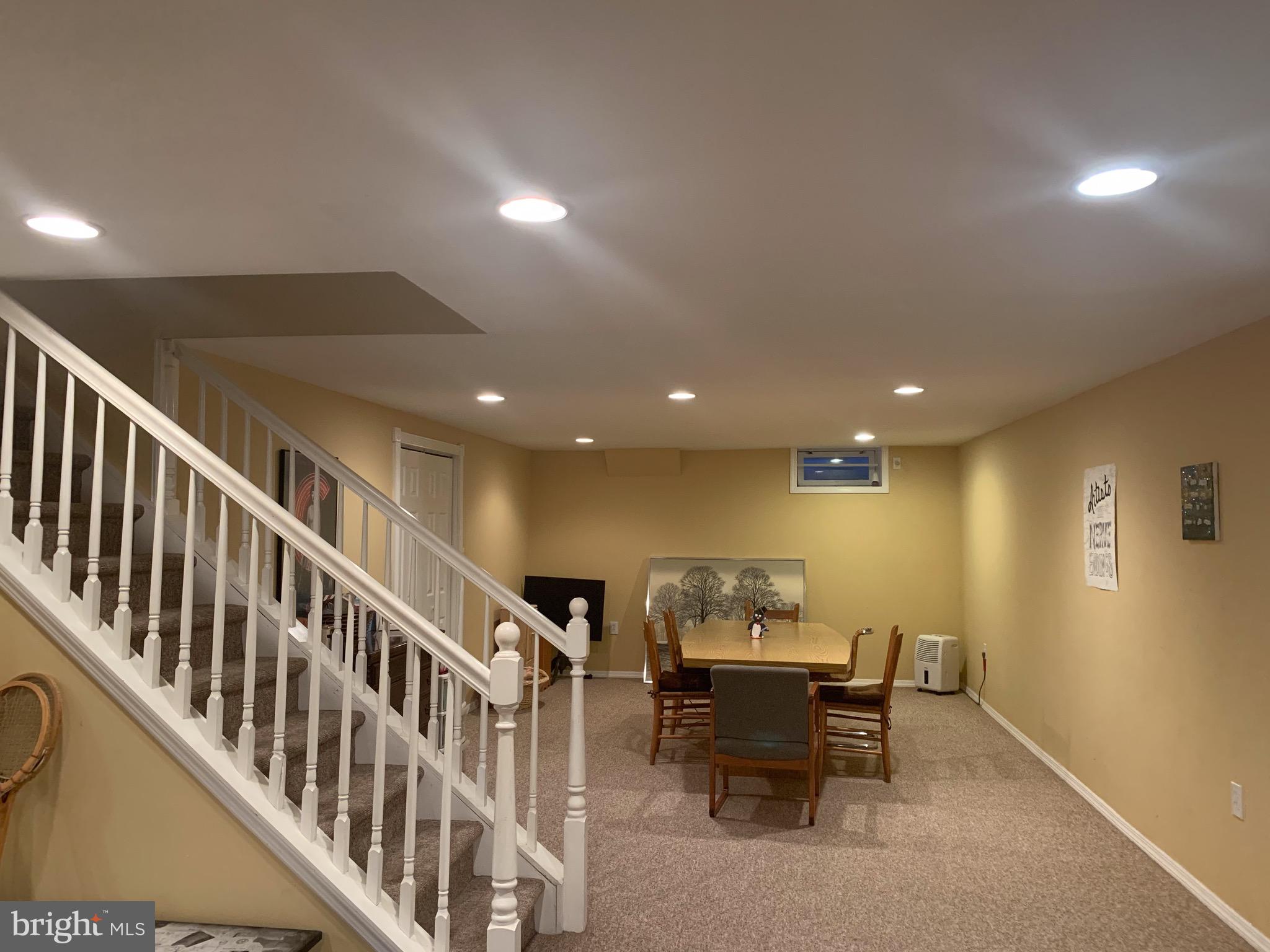 1292 Heller Drive Yardley, PA 19067 - Photo 35 of 36 a view of a a dining room with furniture window and wooden floor