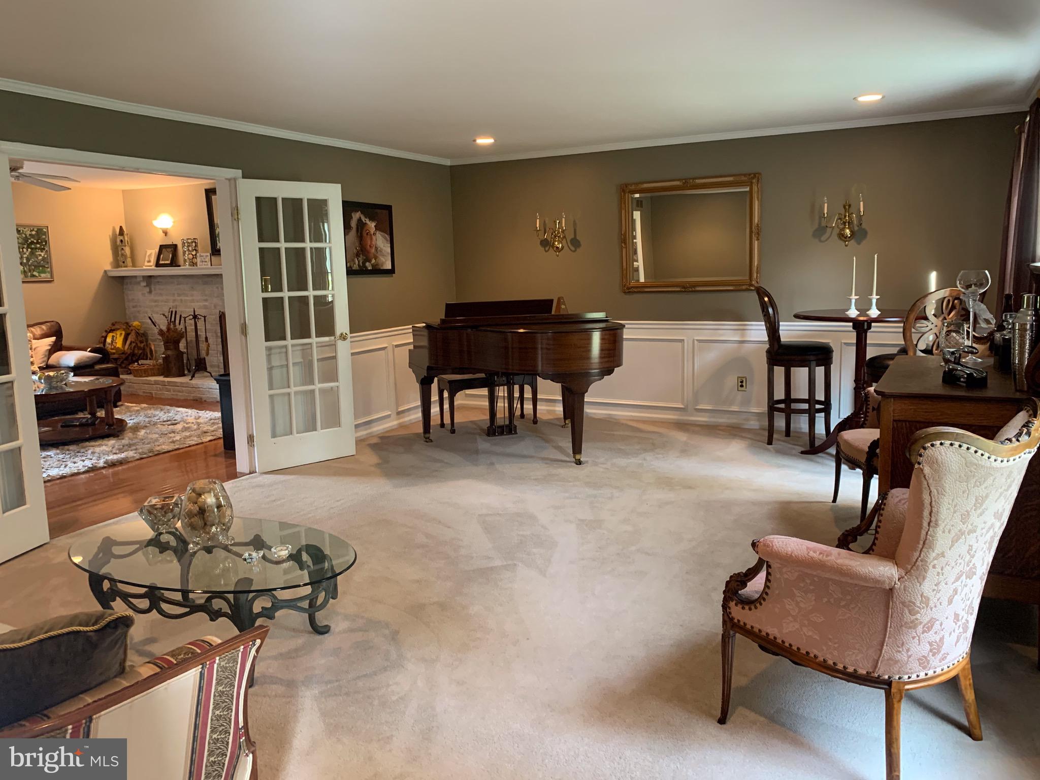 1292 Heller Drive Yardley, PA 19067 - Photo 10 of 36 a living room with furniture and a flat screen tv