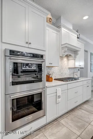 a bed room with a bed and a window