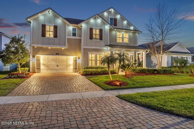 a view of a dining room and livingroom with furniture