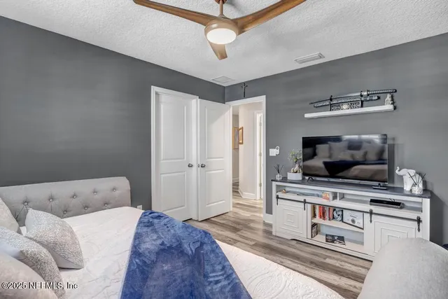 a view of a park with swings and slides