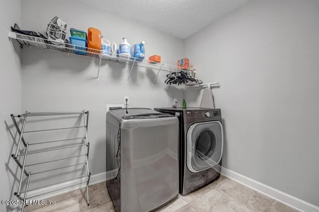 an aerial view of lake residential house with outdoor space and seating
