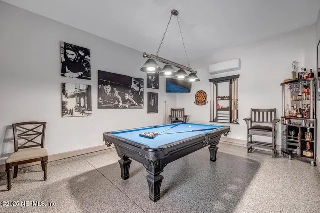 a view of a swimming pool and an outdoor space