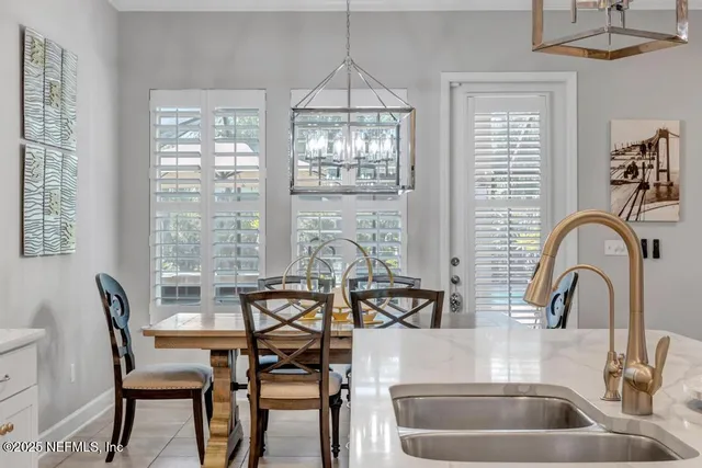 a kitchen with granite countertop cabinets stainless steel appliances and a sink