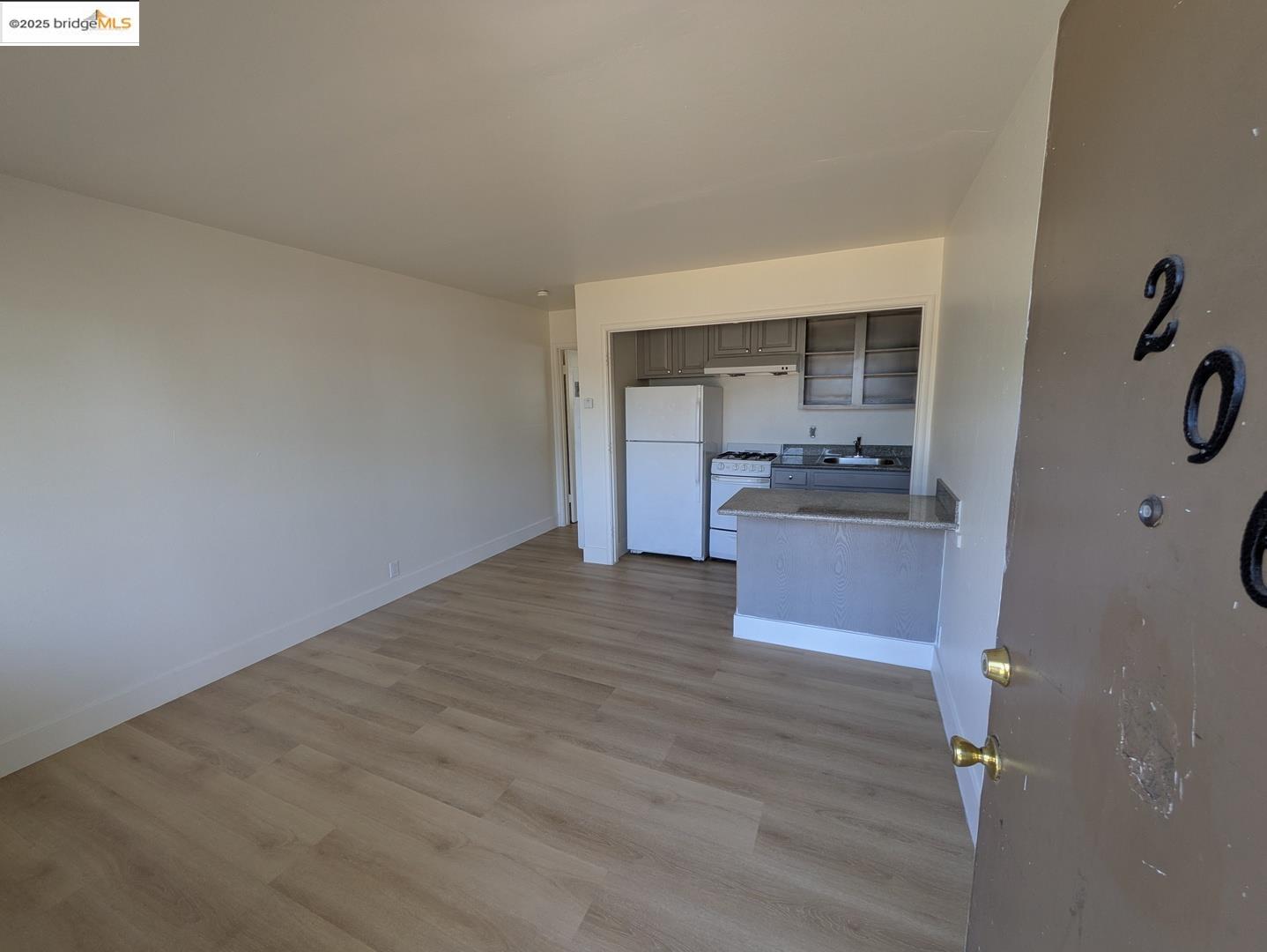 1213 San Pablo Avenue Berkeley, CA 94706 - Photo 4 of 13 a kitchen with a sink and cabinets