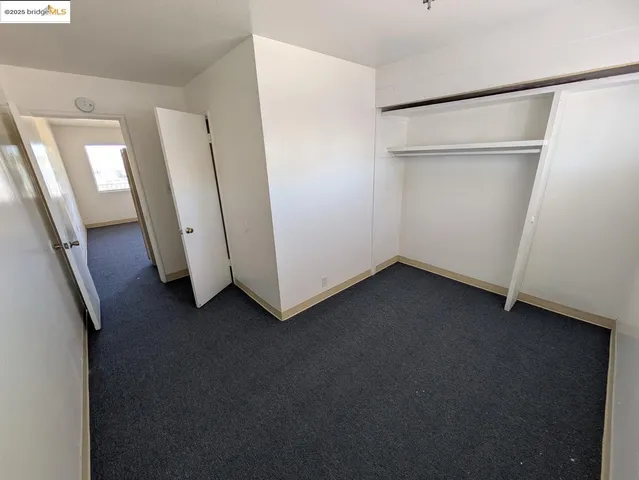a view of staircase with lots of trees in the background