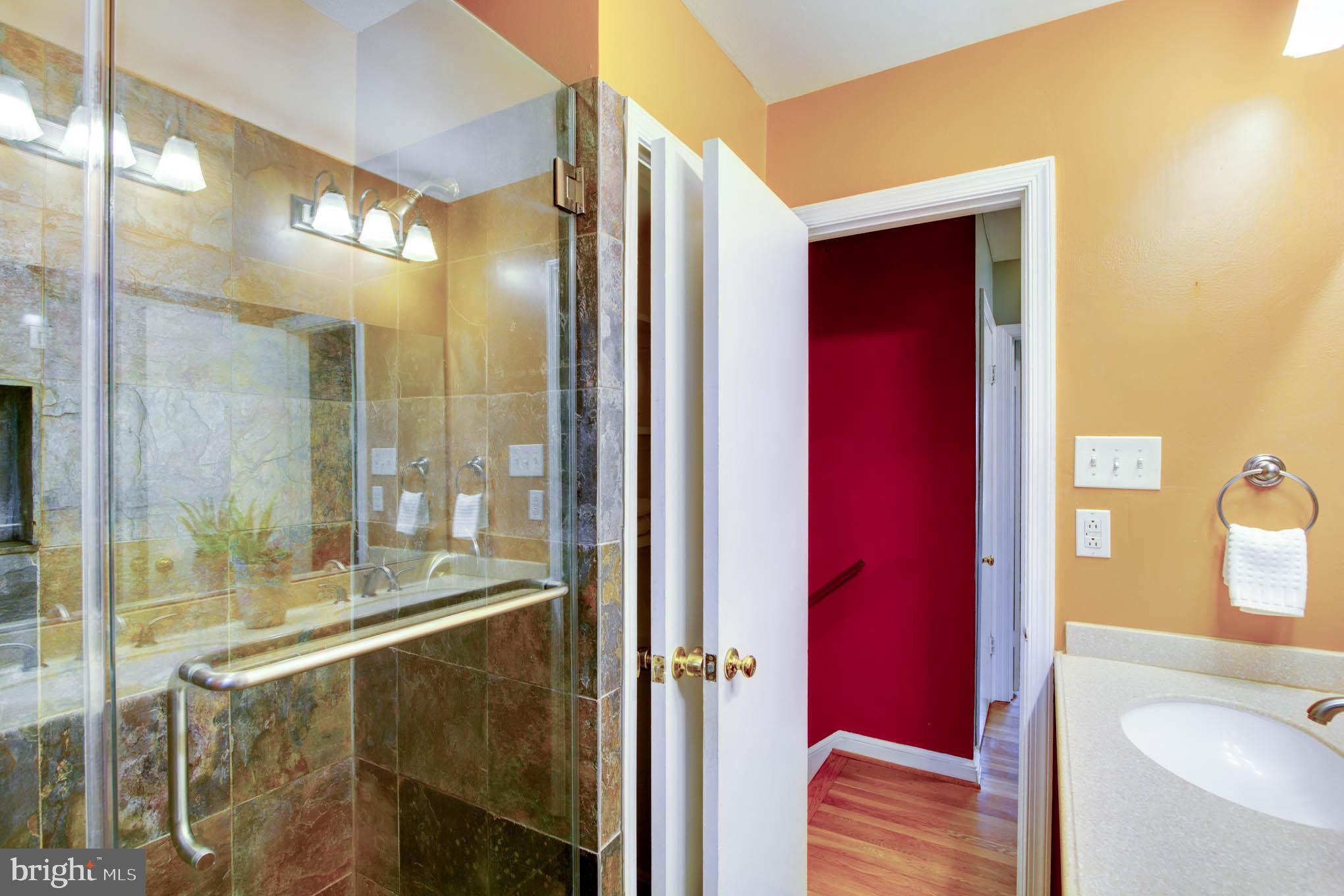7309 Pinecastle Road Falls Church, VA 22043 - Photo 30 of 57 Hall bath features stunning walk-in shower.