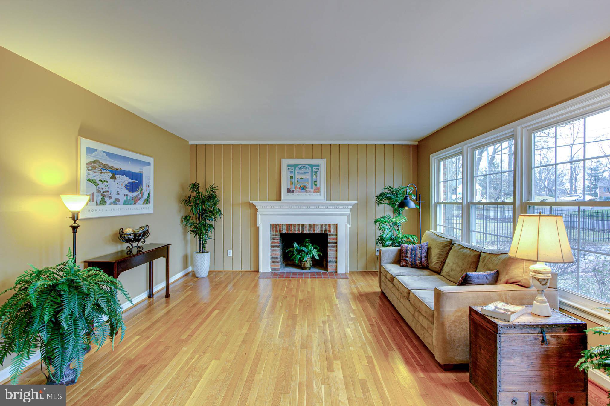 7309 Pinecastle Road Falls Church, VA 22043 - Photo 4 of 57 Spacious living room with wood-burning fireplace.