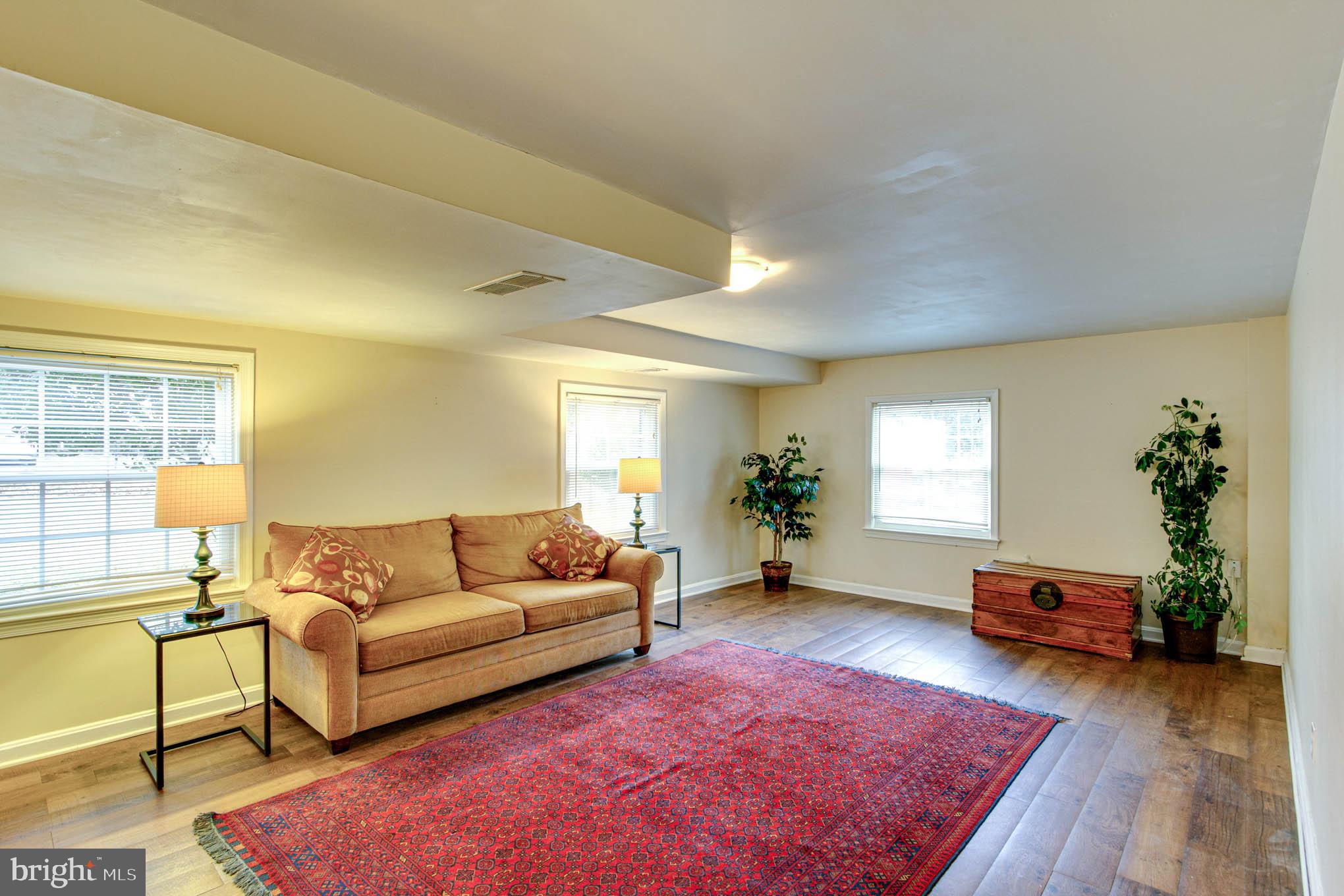 7309 Pinecastle Road Falls Church, VA 22043 - Photo 35 of 57 Inviting family room with lots of windows.