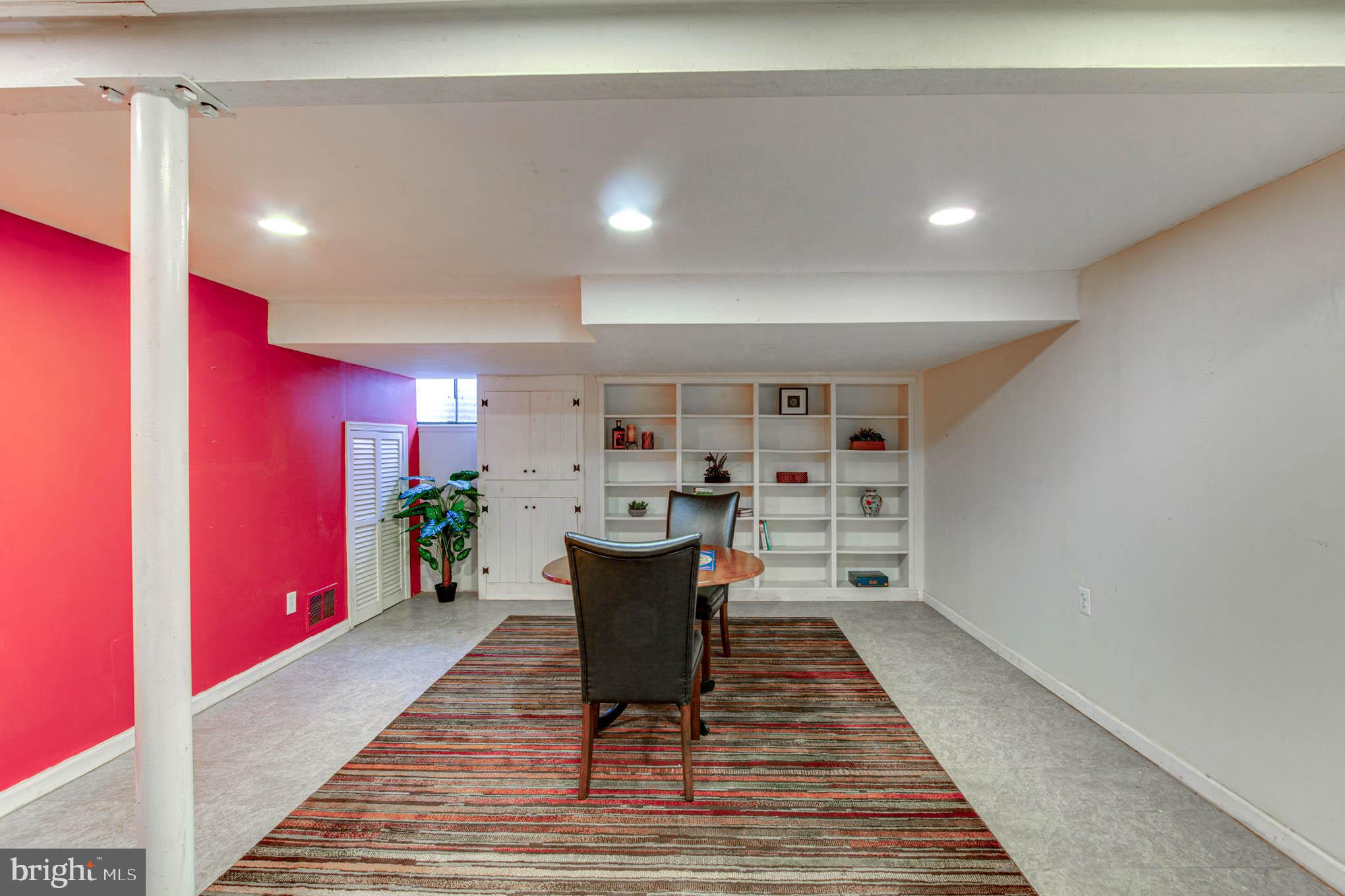 7309 Pinecastle Road Falls Church, VA 22043 - Photo 41 of 57 Wall of built-ins and recessed lighting.