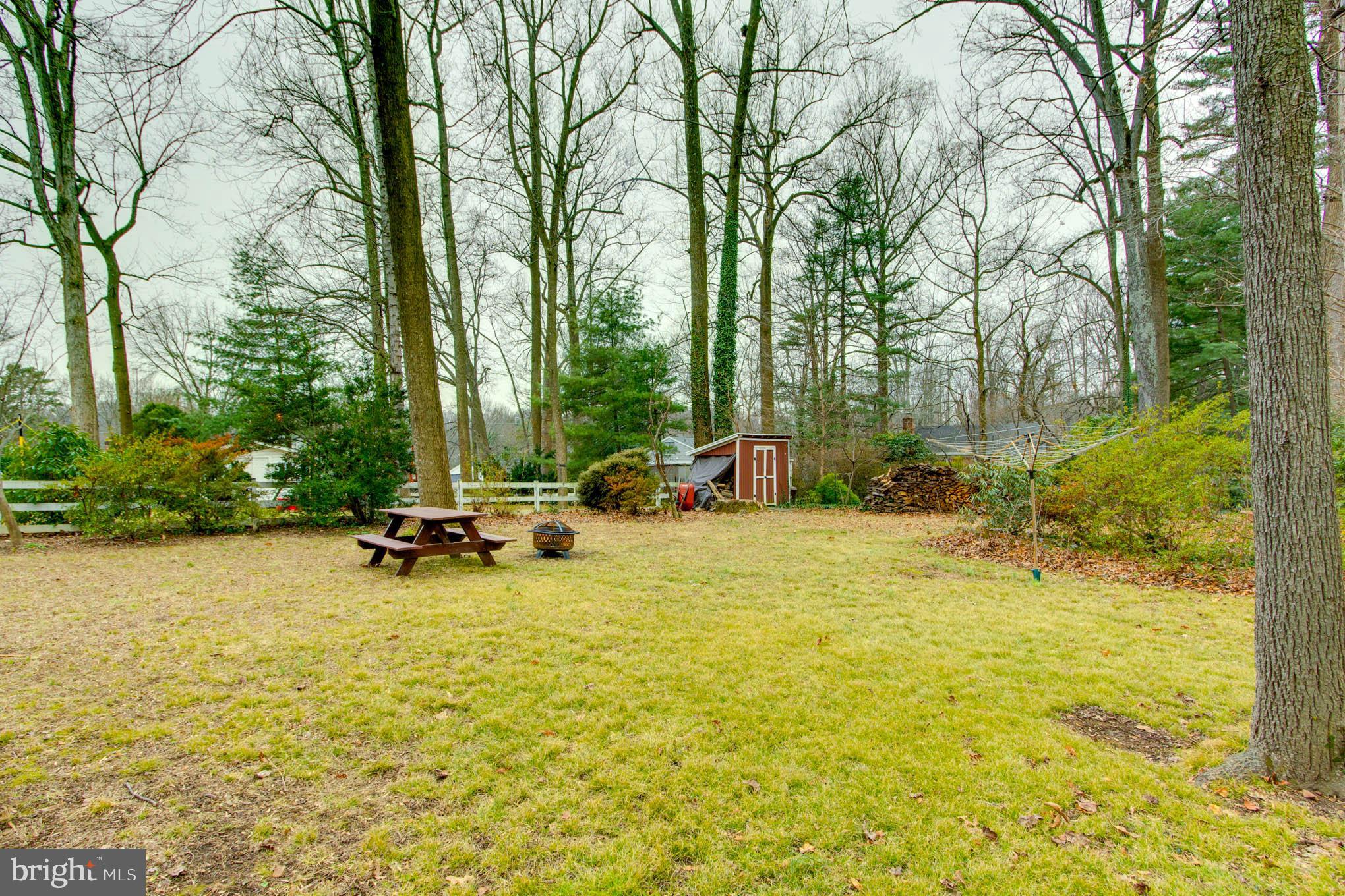 7309 Pinecastle Road Falls Church, VA 22043 - Photo 48 of 57 Picnic table and firepit convey!