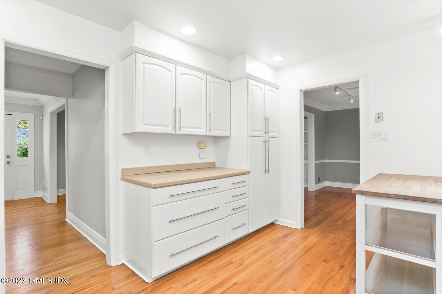 6 Pintail Lane Greenwich, CT 06830 - Photo 18 of 41 a kitchen with granite countertop white cabinets and white appliances