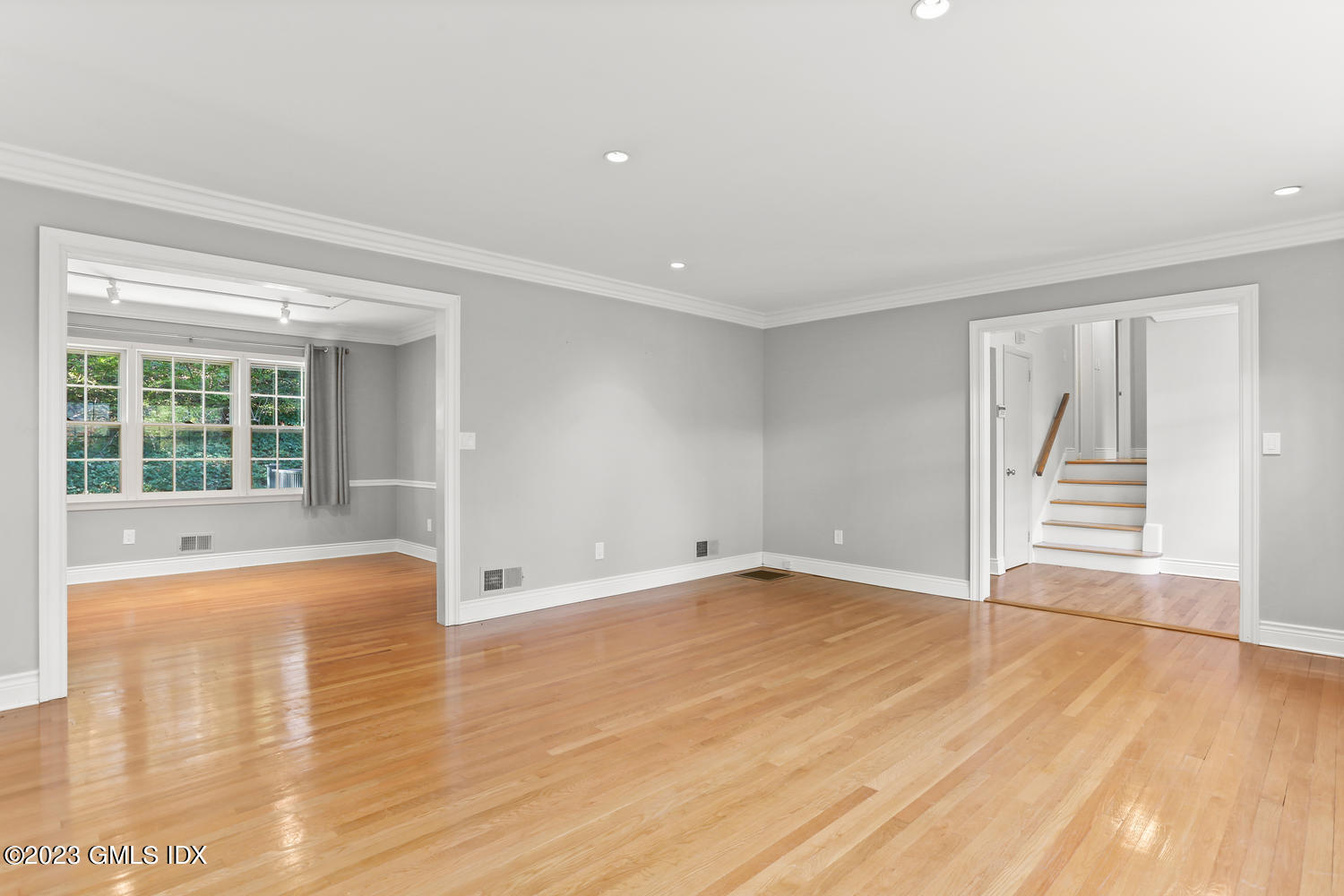 6 Pintail Lane Greenwich, CT 06830 - Photo 5 of 41 a view of empty room with wooden floor and fan