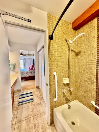 a bathroom with a sink and a bathtub