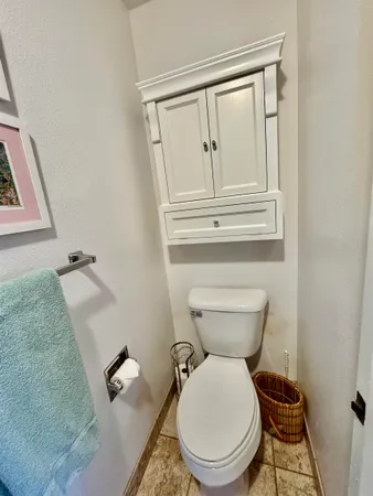 a bathroom with a toilet and a sink