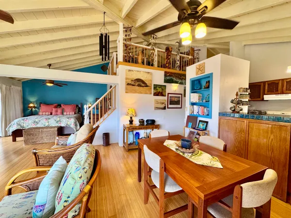 a dining room with furniture and a table