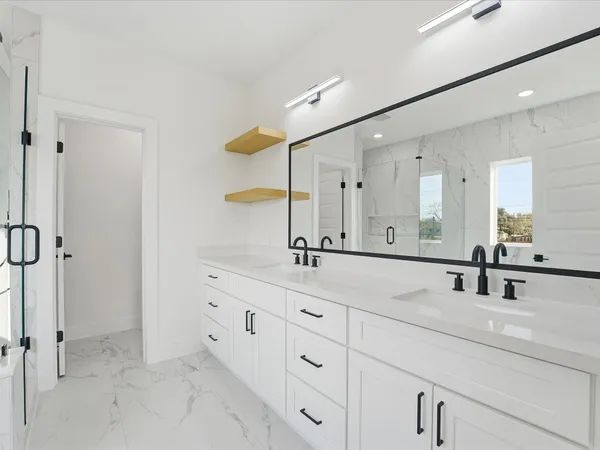 a white bath tub sitting next to a window