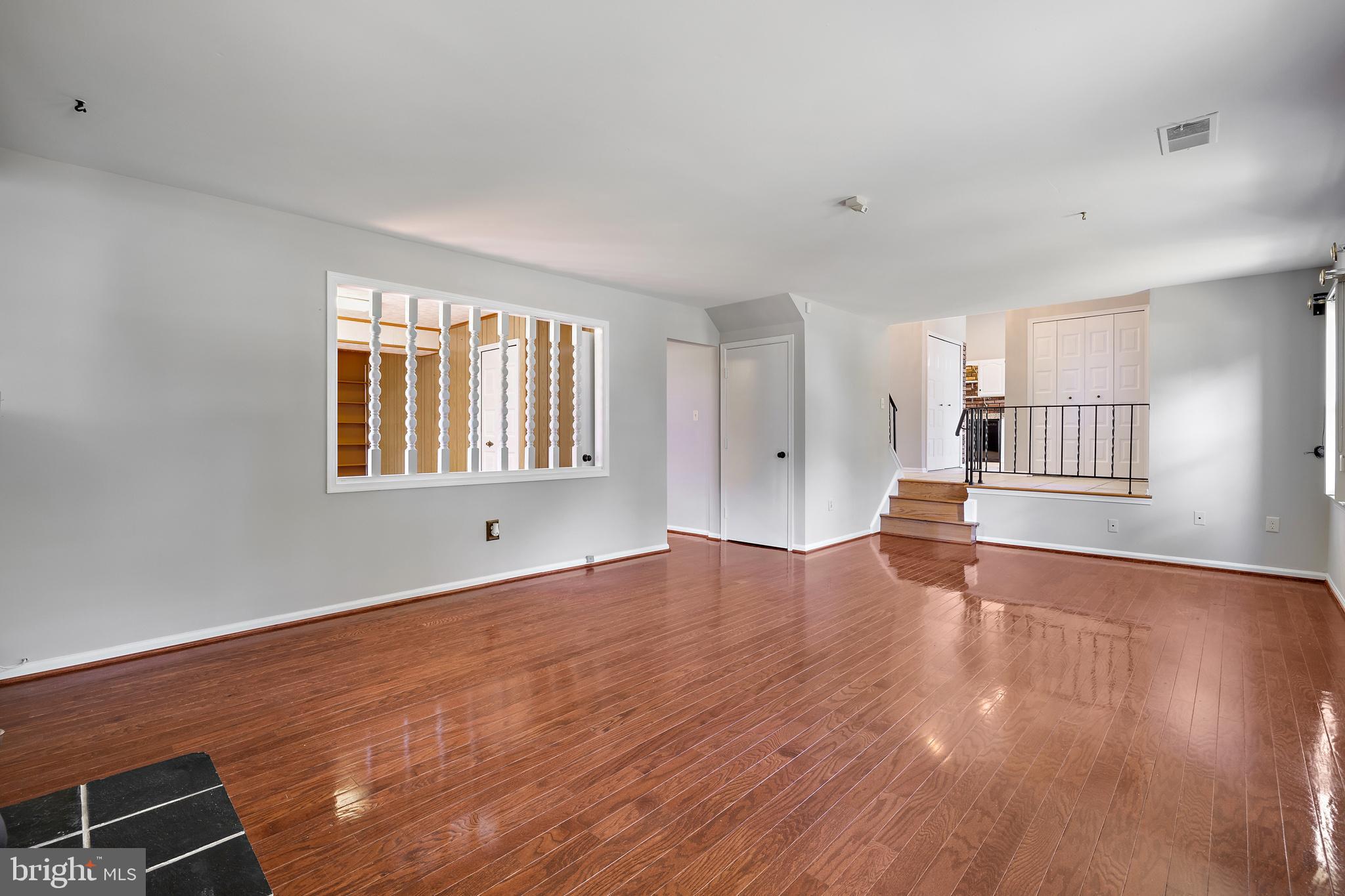 4906 Ten Mills Road Columbia, MD 21044 - Photo 19 of 54 Hardwood floors in the family room
