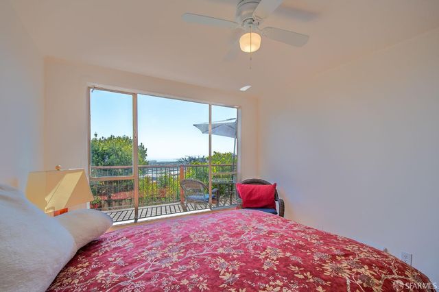a view of a balcony with chairs