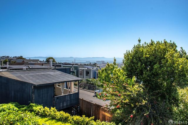 a view of ocean and building