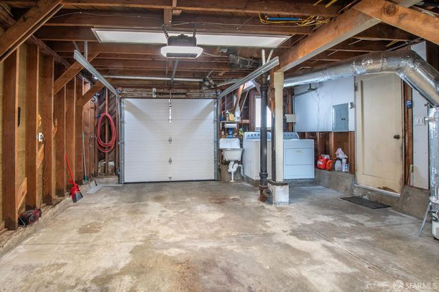 a front view of a building and trees