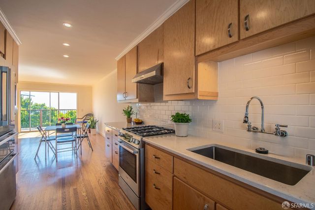 a view of a bathroom from a hallway