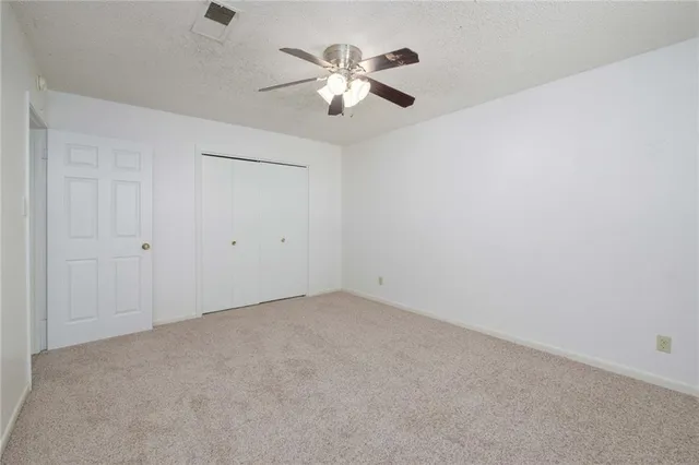 a bathroom with a sink a toilet and tub