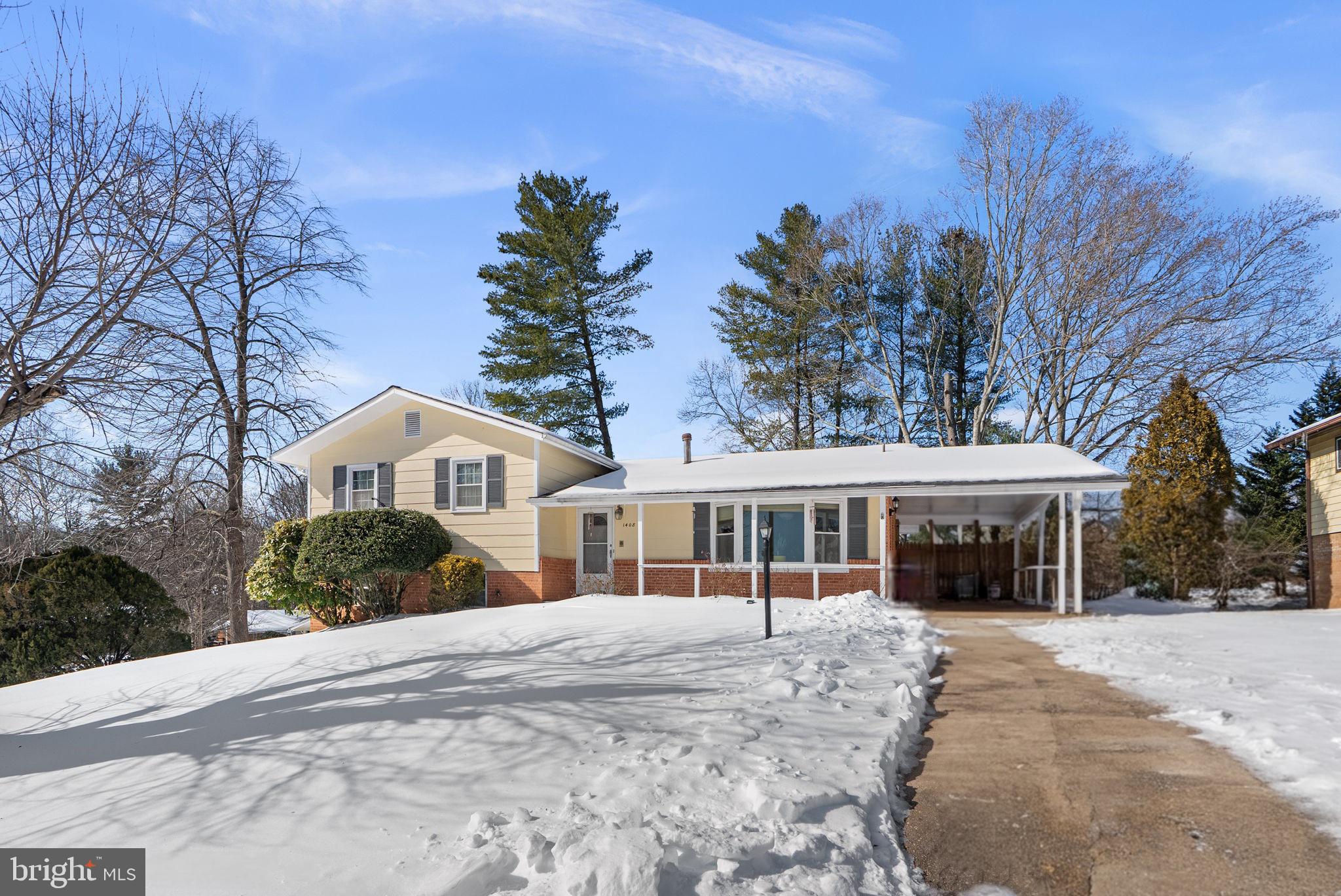 1408 Chilton Drive Silver Spring, MD 20904 - Photo 1 of 29 a front view of a house with a yard and trees